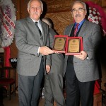 Kazım MEMİÇ plaketini alırken